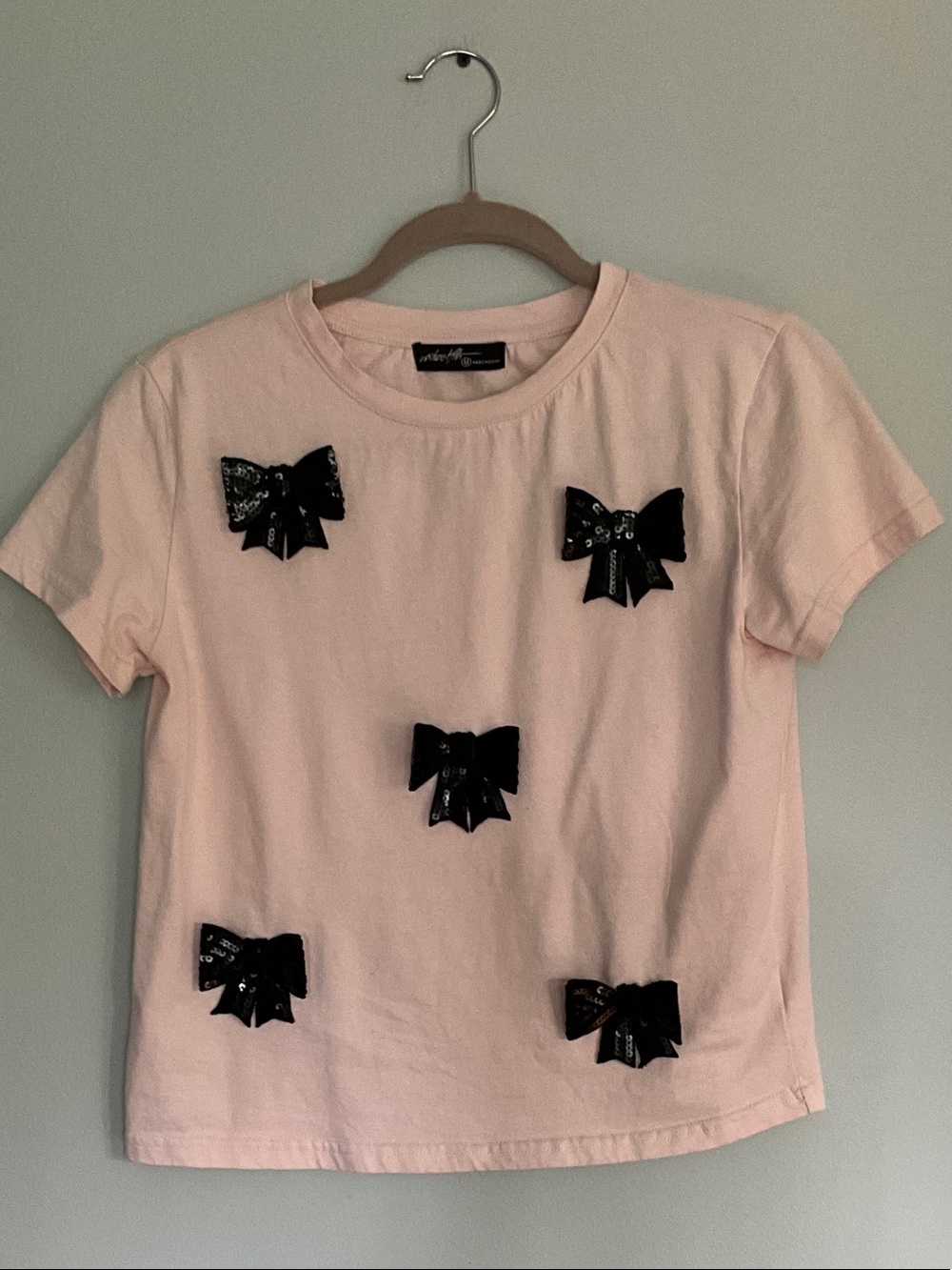 Light Pink Short Sleeve Tee with Black Bow Accents